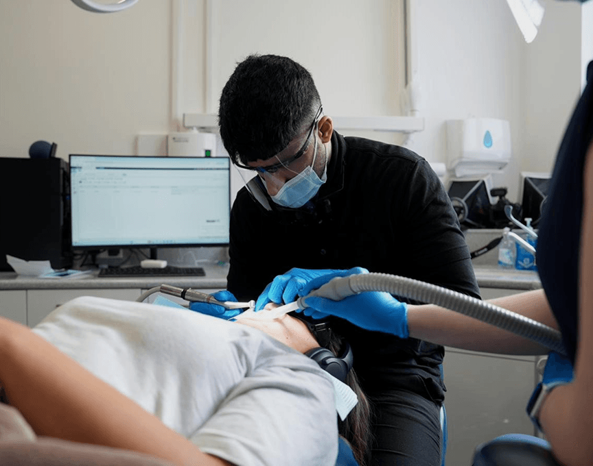 Dr Naeem Ashfaq treating a patient at Regent Dental, Ilkley