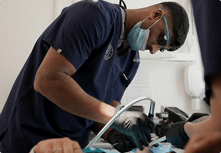 Dr Naeem Ashfaq treating a patient at Regent Dental
